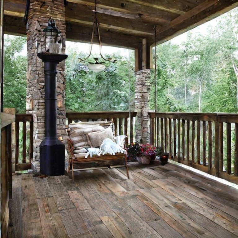 What are the pros and cons of using wood as a rustic porch flooring