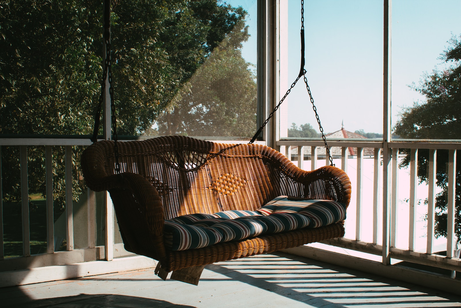 How do I choose the right porch swing for my country porch